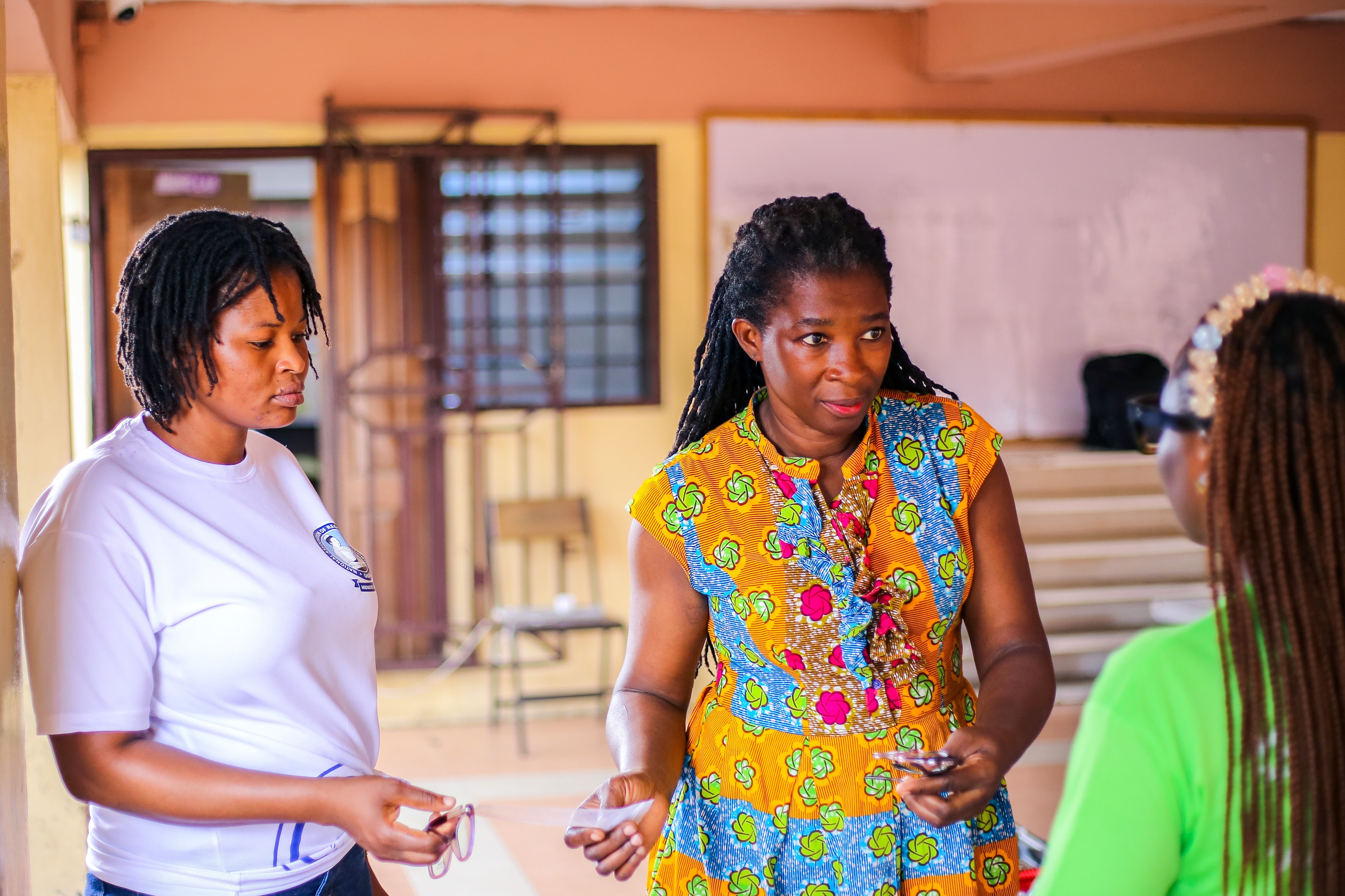 Staff member speaking warmly with a patient